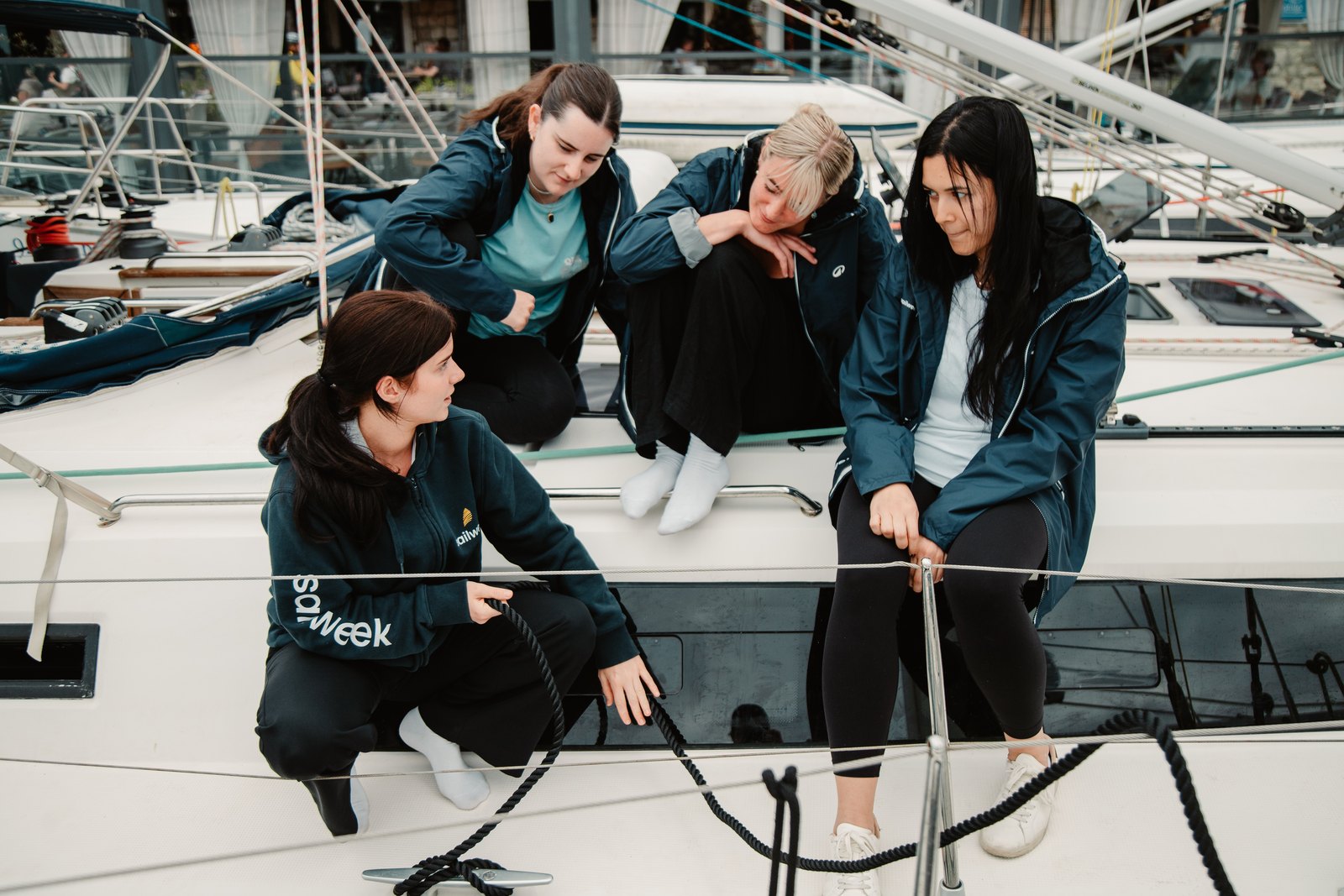 Host Academy participants practising teamwork on deck